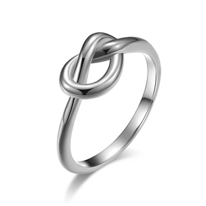 Polished titanium steel love knot ring with shiny silver finish on a white background