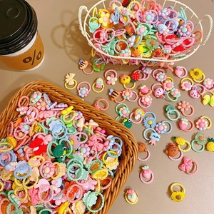 Colorful kids hair ties set with cute cartoon fruits and animals in macaron colors