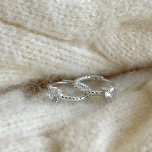 Elegant 925 silver hoop earrings with twisted texture and round cubic zirconia stones