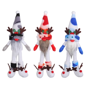 Three plush Christmas reindeer gnomes in gray, red, and blue camouflage tall hats