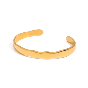 Polished gold wave texture open bangle bracelet in stainless steel for a modern look