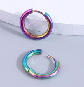 Rainbow plated stainless steel hoop earrings showing hinged closure mechanism details