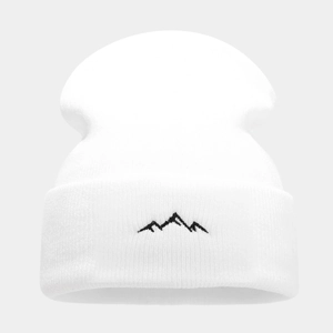 White knit beanie hat featuring a minimalist black mountain embroidery on the cuff