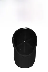 Internal view of black cotton baseball cap showing breathable holes and adjustable strap