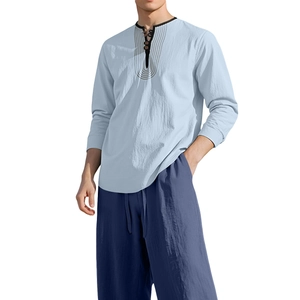 Men's casual linen beach set with a light blue long sleeve shirt and dark blue pants