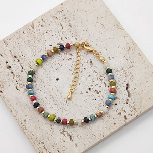 Handmade bohemian beaded bracelet with natural stones and gold adjustable lobster clasp