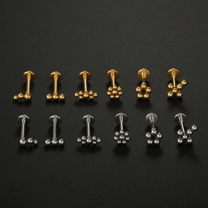 Clous de piercing en acier inoxydable doré et argenté avec divers motifs géométriques