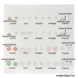 Tableau des tailles détaillé pour 20 paires de boucles d'oreilles en alliage variées
