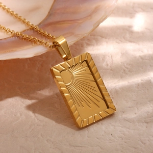 18K gold plated stainless steel sunburst rectangle pendant necklace on natural shell