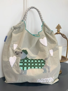Nylon tote bag with embroidered dachshund and heart pattern on light beige fabric