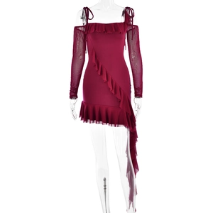 Detailed view of burgundy off-shoulder dress with mesh sleeves and ruffle hem