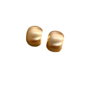 Minimalist golden geometric C-shaped hoop earrings with a brushed metal texture finish