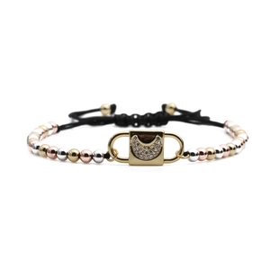Adjustable black cord bracelet with copper beads and zircon crescent moon pendant