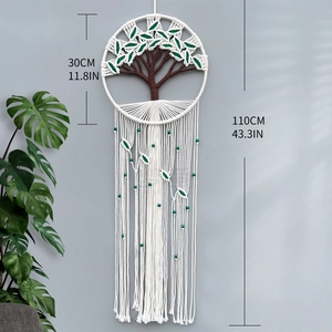 Handwoven Tree of Life macrame wall hanging with green beads and cotton tassels