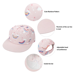 Adjustable kids pink flat brim baseball cap featuring rainbow and star prints