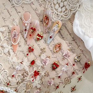 Baroque style nail art stickers with vintage angel designs and metallic gold heart accents