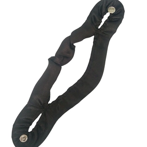 Elegant black fabric bun maker with satin finish and silver metal snaps for hair styling