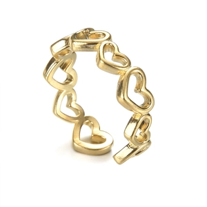 Minimalist gold stainless steel open ring featuring continuous hollow heart shaped patterns