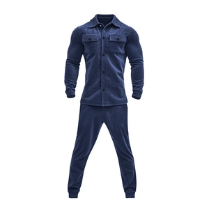 Detailed macro view of blue faux suede fabric texture on men's jacket and trouser set