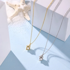 Detailed close-up of S925 silver ocean shell necklaces with pearls and zircons