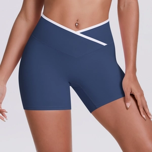 Women's high waist yoga shorts with navy fabric and white V-cross waistband for fitness
