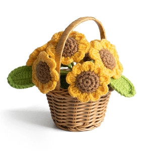 Handmade crochet sunflower in a brown wicker basket home office desktop ornament