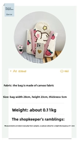 Detail view of canvas tote with cartoon bear print and dimensions 28x23x5cm