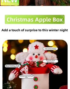 Detail of Christmas snowman knitted apple gift box with red star hat and scarf