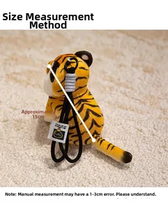 Detailed view of the 15cm tiger plush keychain showing its measurement and soft texture