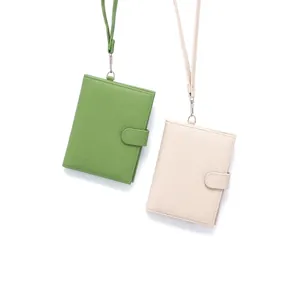 Slim leather passport wallet with lanyard and litchi texture in green and white