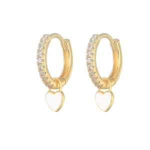 Detailed view of heart-shaped hoop earrings with white enamel and sparkling zircons