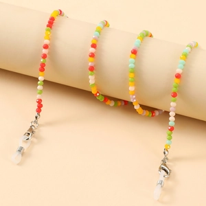 Macro detail of multi-colored crystal bead eyewear chain with silver lobster clasps