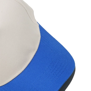 Detail of reinforced six-row stitching on contrasting brim of baseball cap