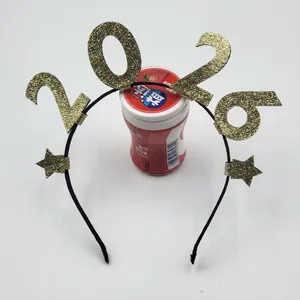 Detail of 2026 New Year headband with gold glitter stars and numbers for festive parties