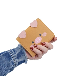 Cute yellow cartoon pig wallet for women featuring heart-shaped ears and multi-card slots