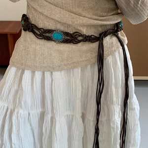 Ethnic braided waist belt with oval turquoise centerpiece and hollow lace metal design