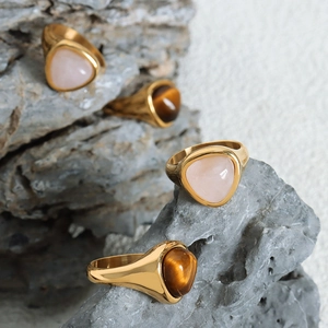 Minimalist gold-plated stainless steel rings with natural rose quartz and tiger eye stones