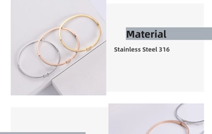Detail of 316 stainless steel hinged cuff bracelets with pavé stones in three colors