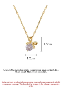 Detail view of 40+5cm gold titanium necklace with micro-pave bow pendant and dimensions