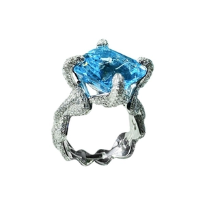 Asscher cut blue topaz ring with diamond twisted band in polished white gold plating
