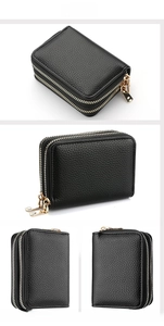 Detail view of black lychee grain PU leather card holder with double gold zippers