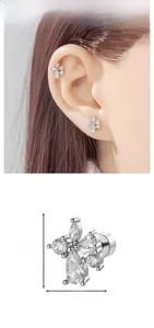 Detail showing cross-cluster earring dimensions 0.98cm by 0.8cm with clear zircon stones