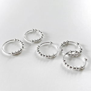 5-piece set of sterling silver minimalist anxiety rings with movable spinning beads