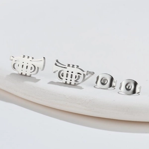 Minimalist vintage silver trumpet stud earrings for women with musical instrument design