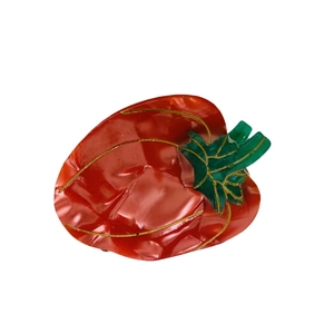Creative persimmon-shaped hair claw clip in pearlescent red acetate with gold detailing
