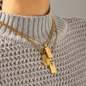 Three-layer gold tarot necklace featuring relief rectangle sun and star pendants