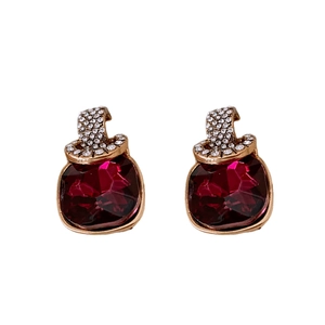 Vintage gold square earrings with faceted purple crystals and sparkling rhinestones