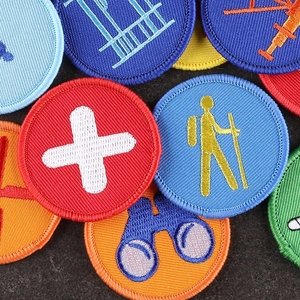 Colorful round embroidered patches with outdoor and medical icons for apparel decoration