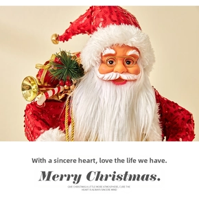Close-up of Santa doll with red sequins, golden glasses and festive gift bag detail