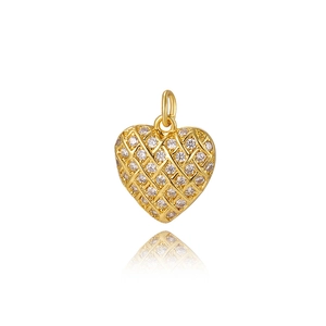 Macro shot of 18k gold plated mesh heart pendant with sparkling crystals on white base